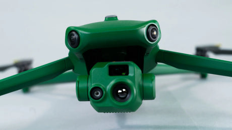 Close-up of a green Anzu Raptor drone with multiple cameras