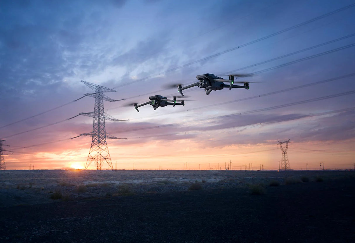 DJI Mavic 3 Enterprise Drone flying over a landscape with power lines